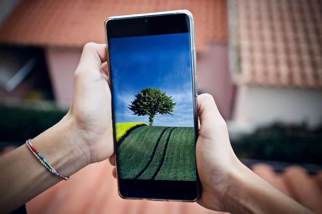 phone with a tree on the screen